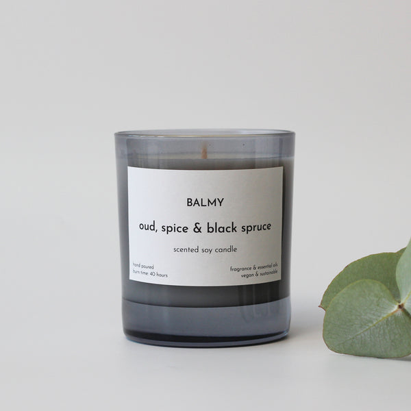 Oud, spice & black spruce scented candle